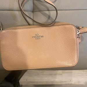 This is a coach cross body clutch, can you make me an offer any OFFER!!!!